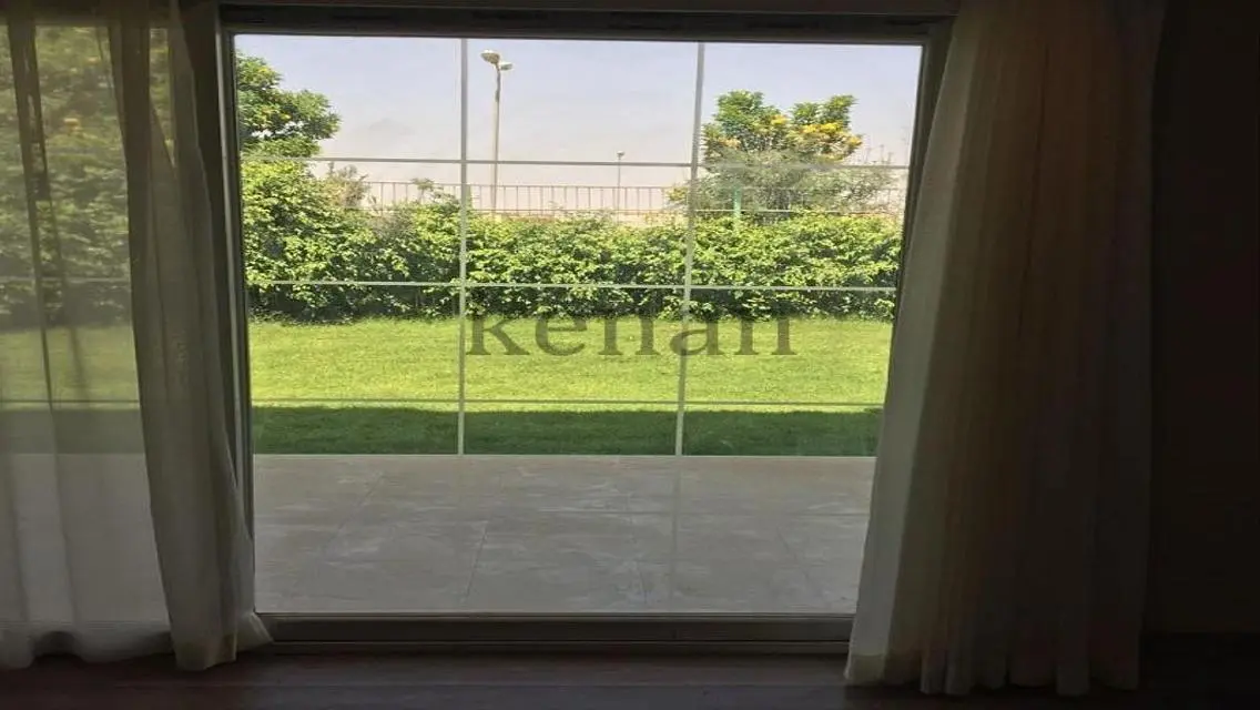 Luxurious Apartment with Private Garden and Shared Pool