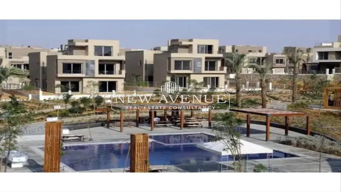 Delivered apartment corner with garden in palm hills