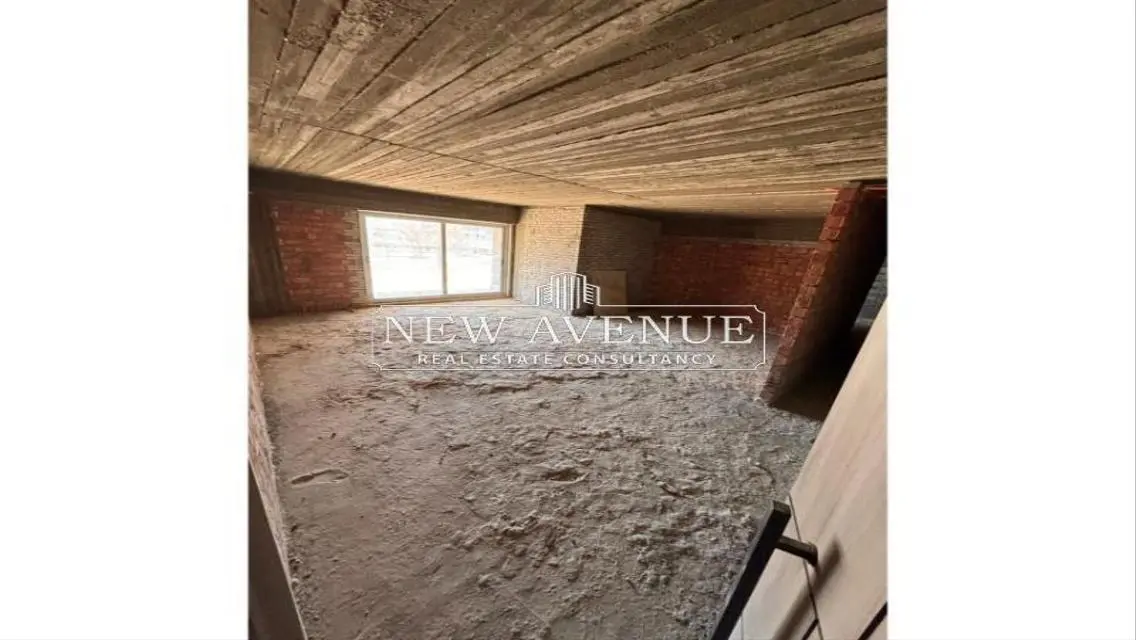 Delivered apartment corner with garden in palm hills