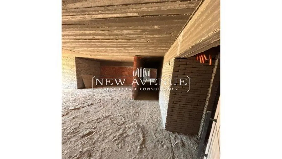 Delivered apartment corner with garden in palm hills