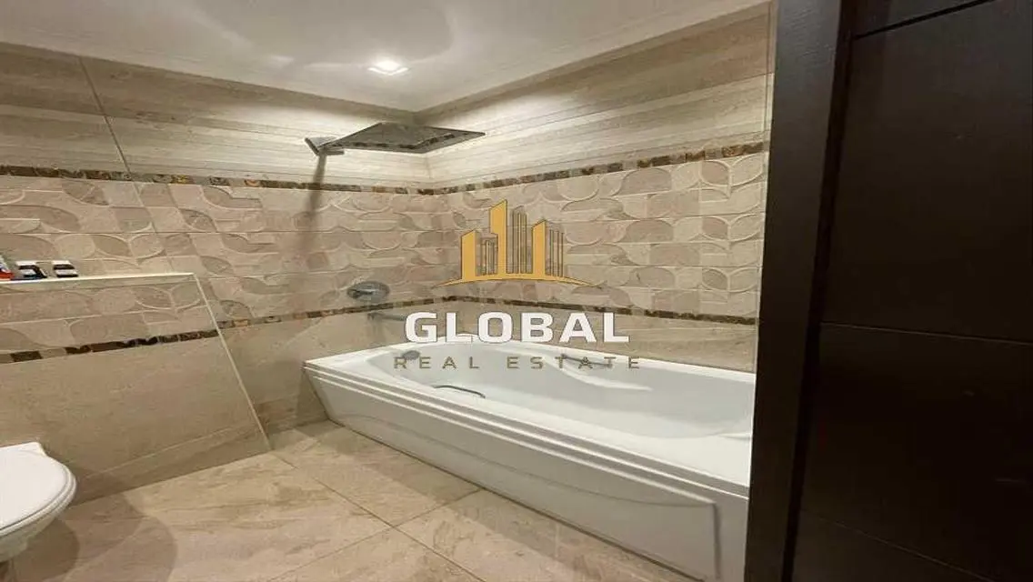 Stylish Apartment with Garden and Shared Pool