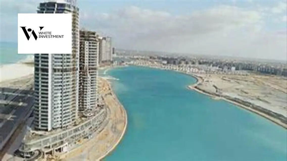 ابراج العلمين شقة 105م متشطبة بالكامل علي اللاجون