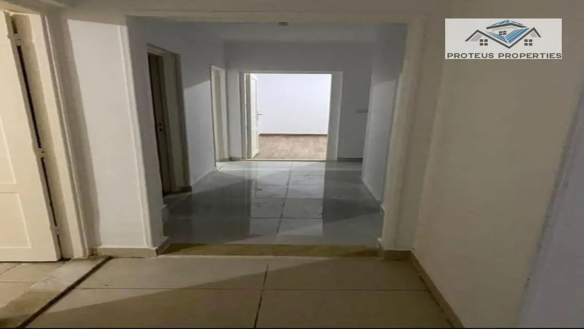 شقة للايجار بالرحاب ارضي بحديقه بجوار مول 2