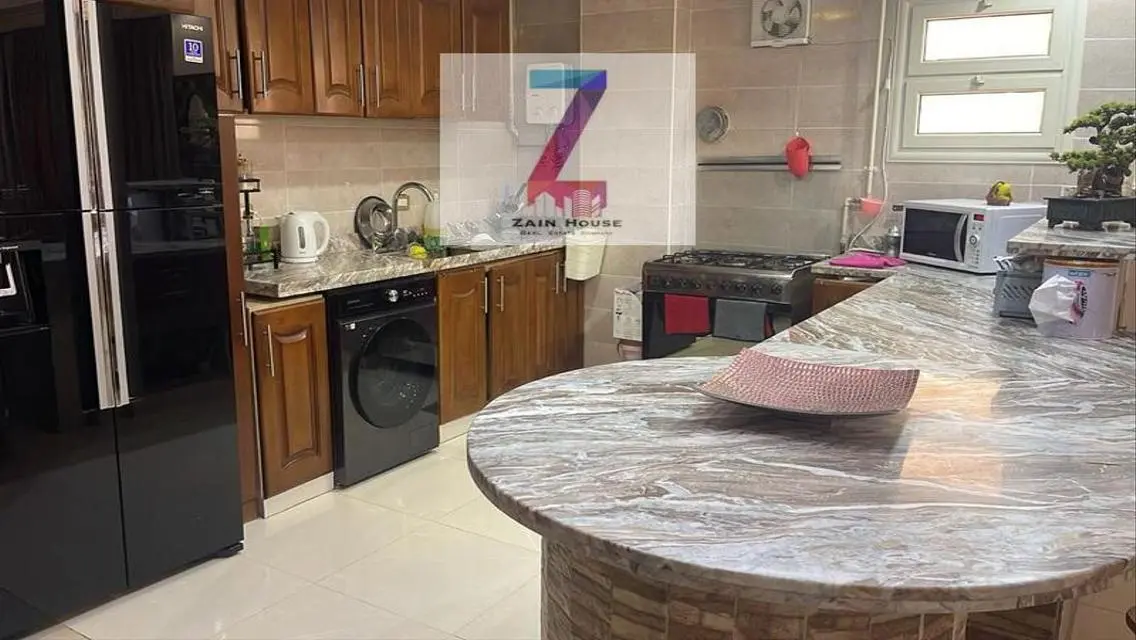 شقة ارضي بجاردن متاحة للبيع في البنفسج 2