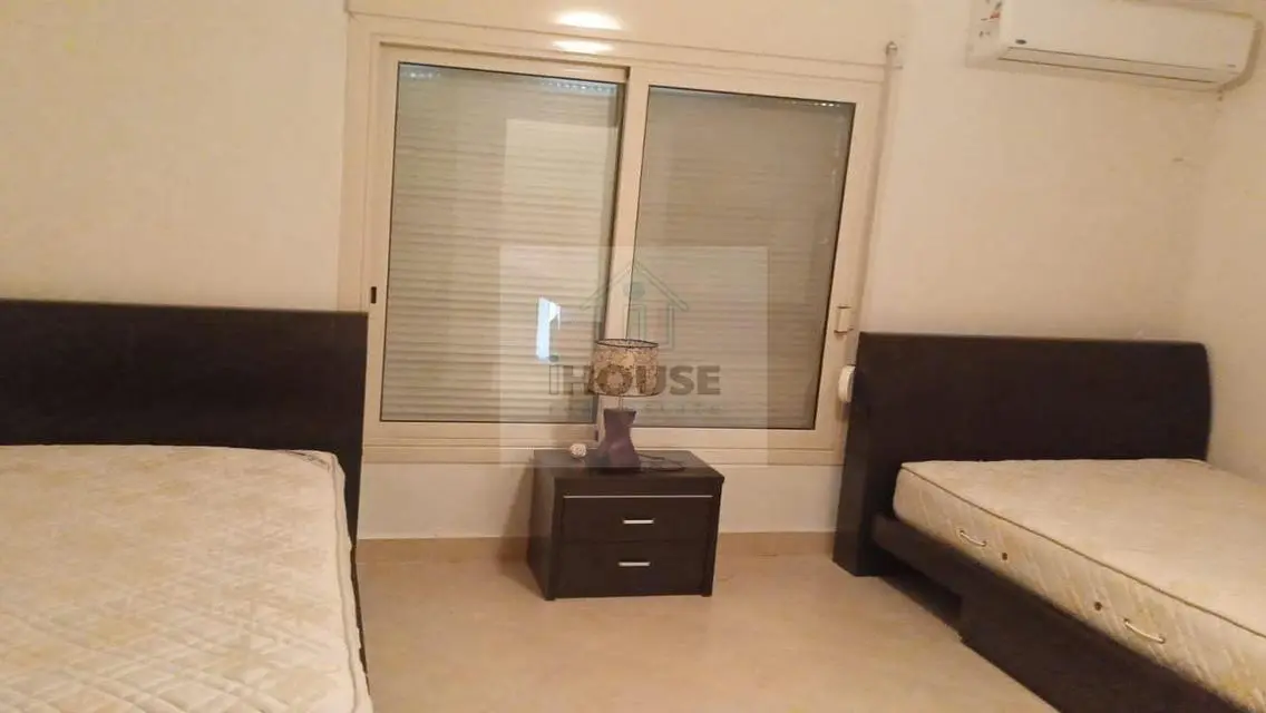 Luxury Apartment with Private Garden and Shared Pool