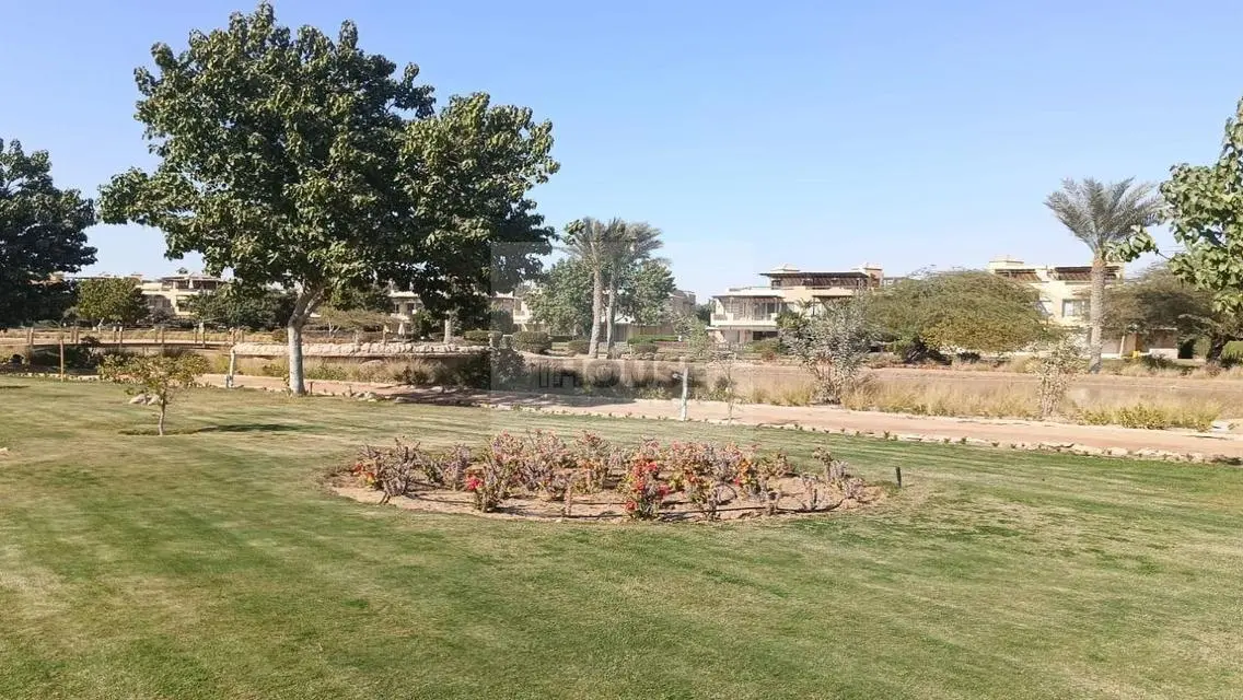 Luxury Apartment with Private Garden and Shared Pool