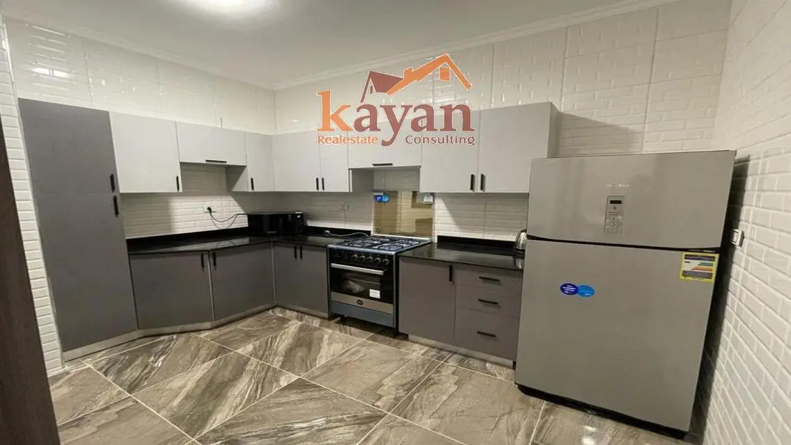 Furnished 2-bedroom apartment with garden for rent