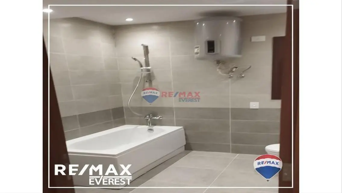 Semi-furnished Garden Apartment -Pyramids Heights