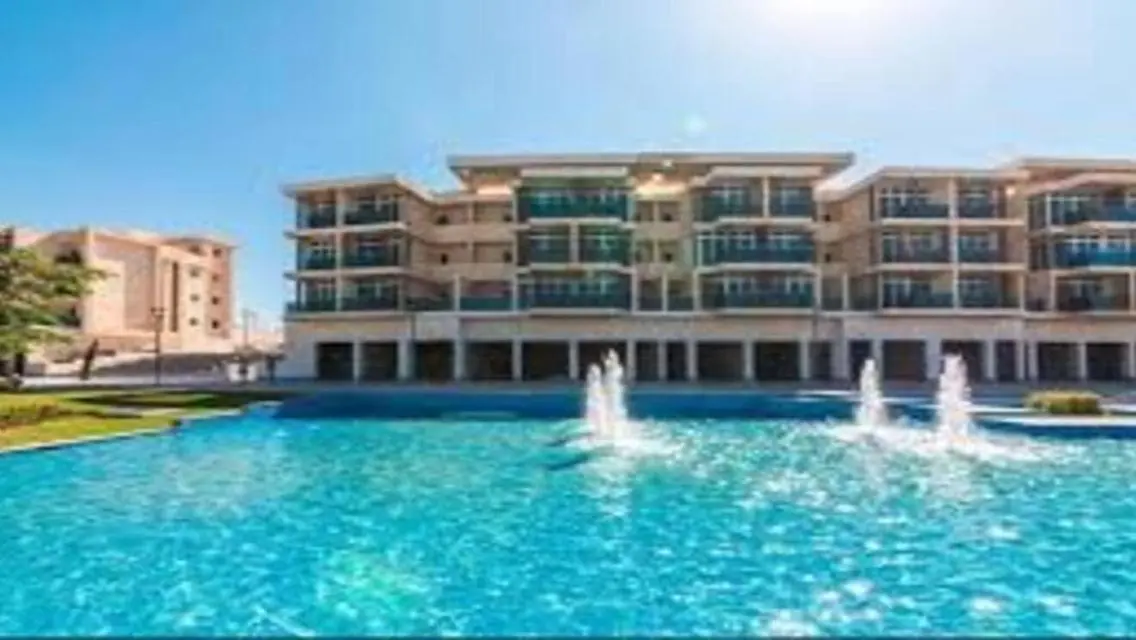 Twin house in Zayed 8K monthly behind Mall of Arab