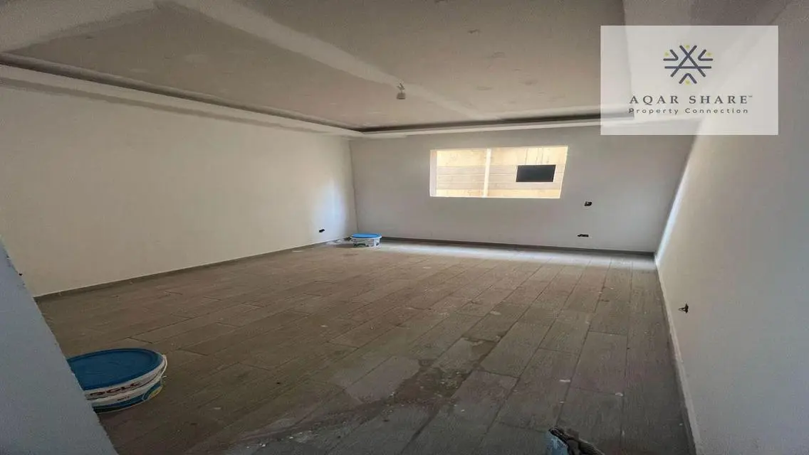 Own your finished apartment near the American Uni