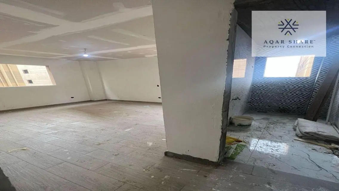 Own your finished apartment near the American Uni