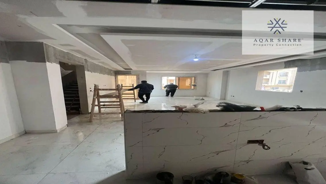 Own your finished apartment near the American Uni