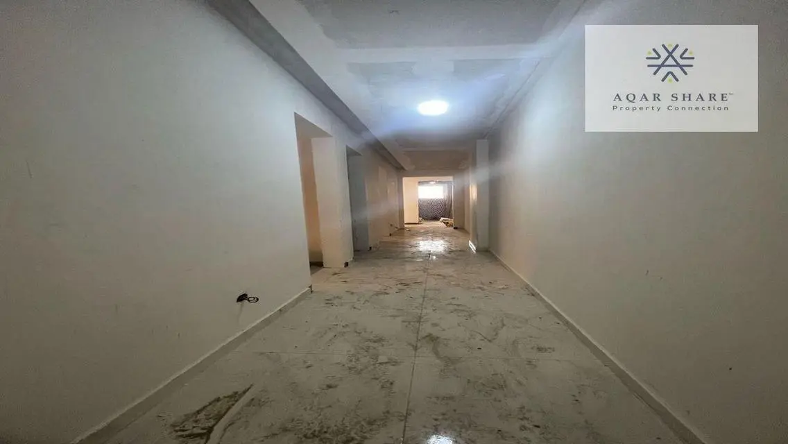 Own your finished apartment near the American Uni