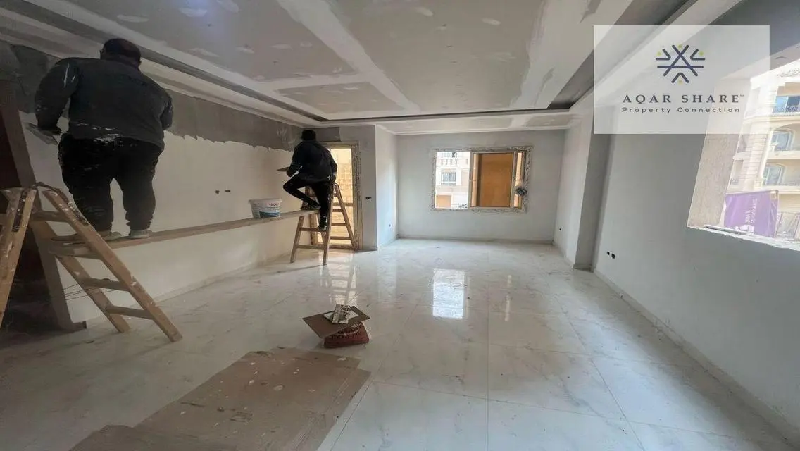 Own your finished apartment near the American Uni