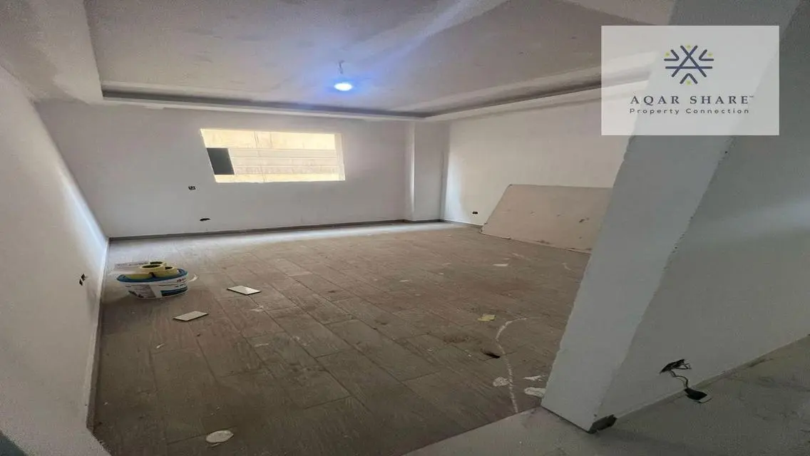 Own your finished apartment near the American Uni