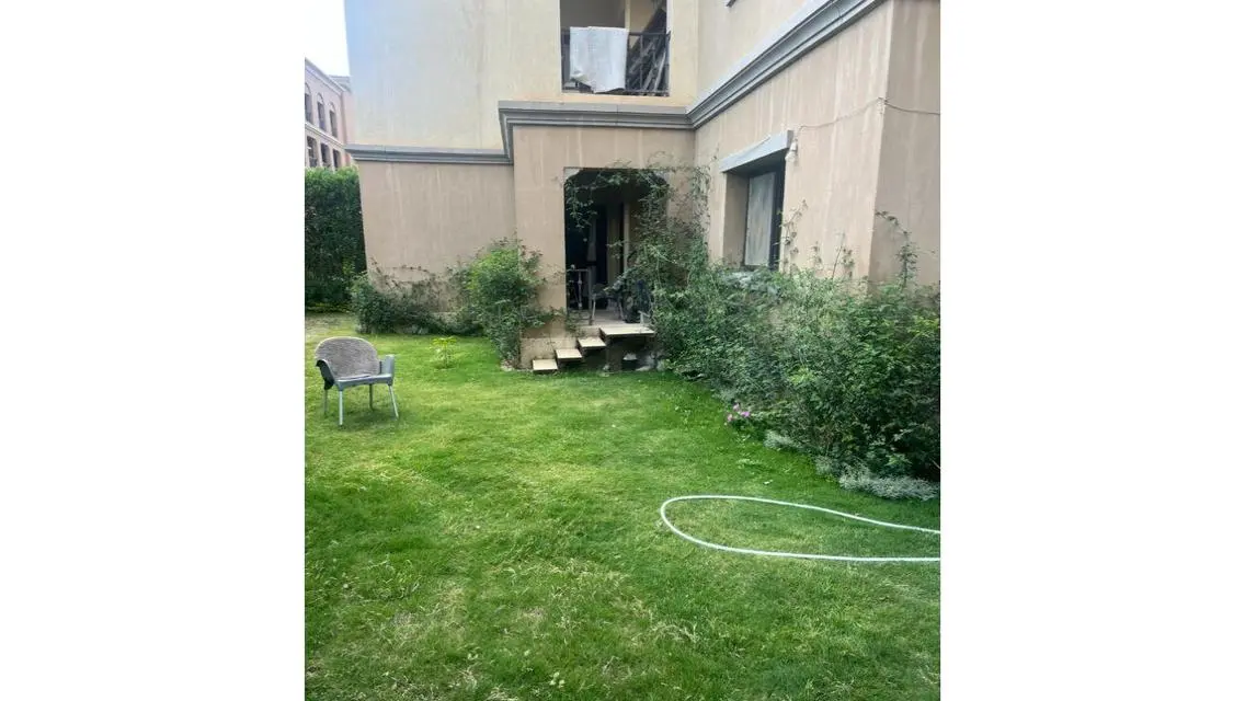 Luxury Apartment with Private Garden and Shared Gym in the Heart of the City