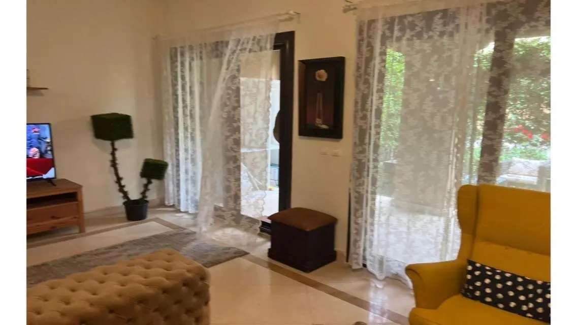 Luxury Apartment with Private Garden and Shared Gym in the Heart of the City