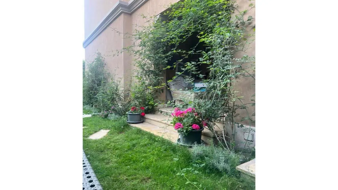 Luxury Apartment with Private Garden and Shared Gym in the Heart of the City