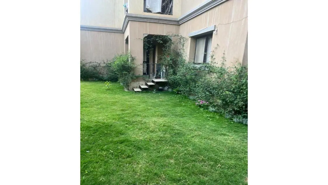 Luxury Apartment with Private Garden and Shared Gym in the Heart of the City