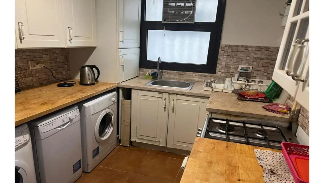 Luxury Apartment with Private Garden and Shared Gym in the Heart of the City