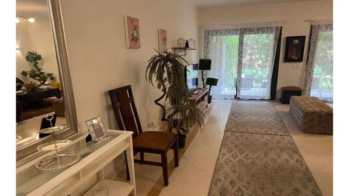 Luxury Apartment with Private Garden and Shared Gym in the Heart of the City