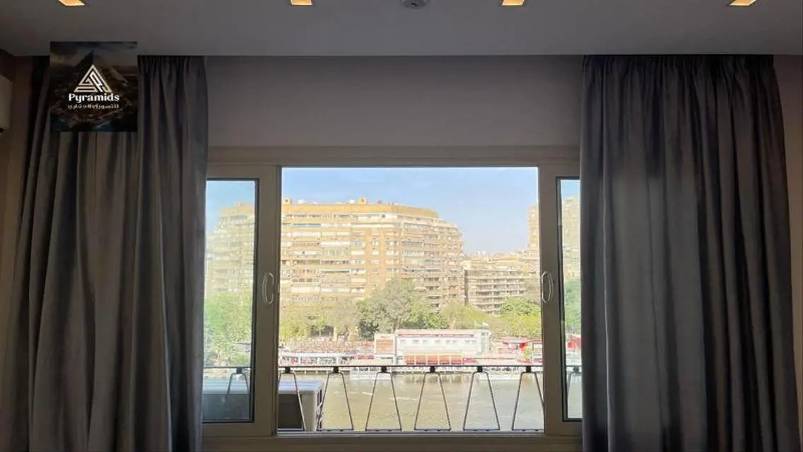 شقه مفروش اول سكن فيو النيل في الدقي    .