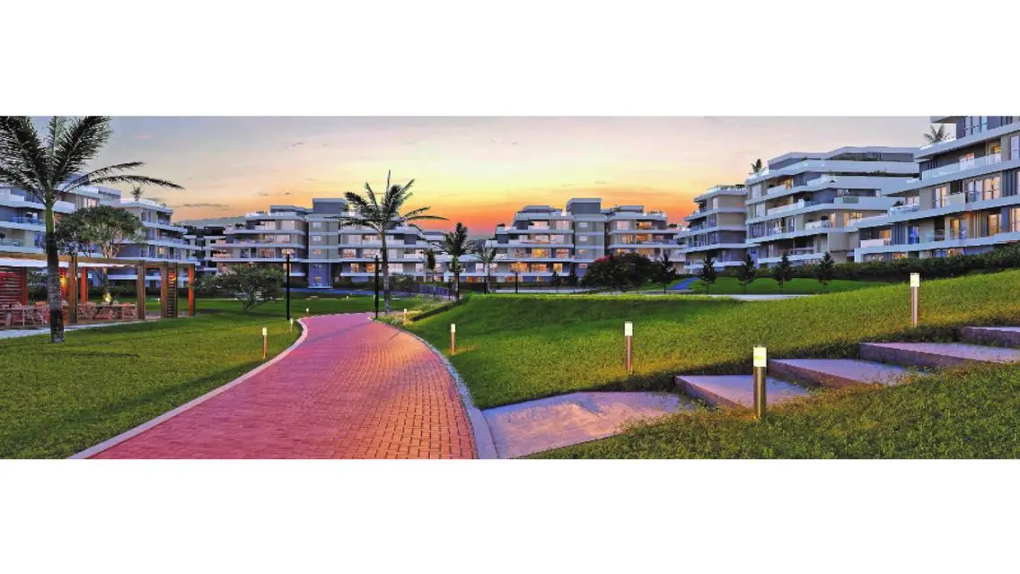 Apartment with garden for sale in Sky Condos 