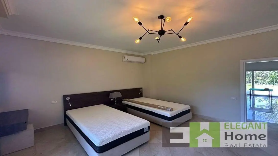 Luxury Villa with Private Garden and Pool in Prime Location