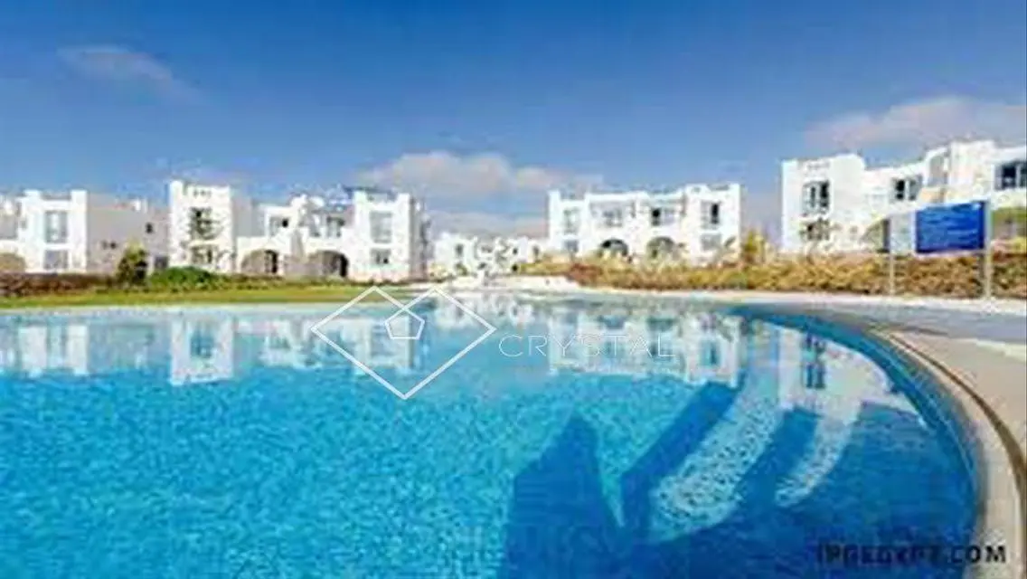 Townhouse with roof in Evia Village, prime locatio